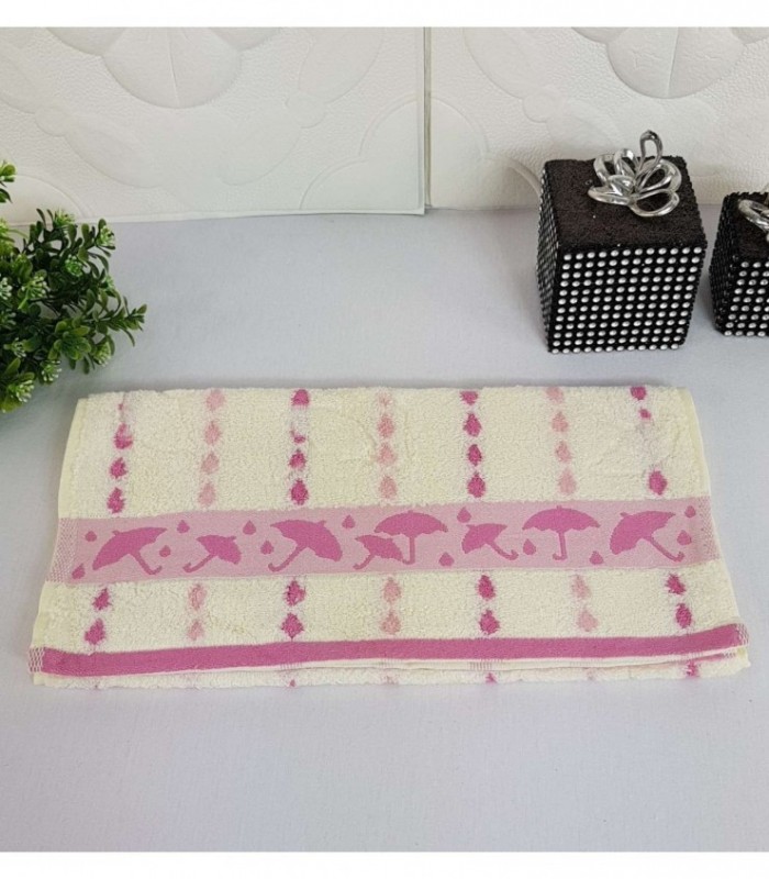TOALLITA 0.35X0.70 COLOR CREMA CON DETALLE ROSADO