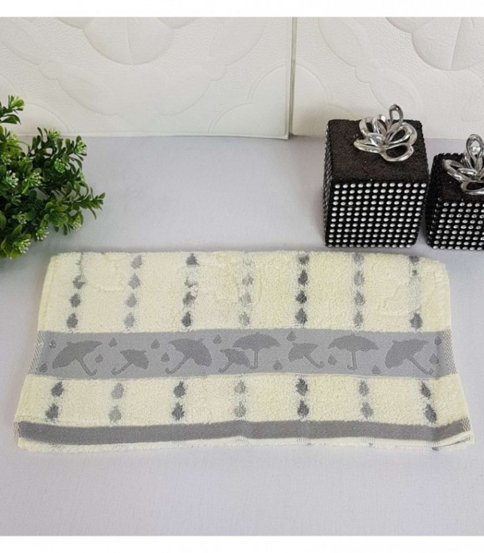 TOALLITA 0.35X0.70 COLOR CREMA CON DETALLE GRIS