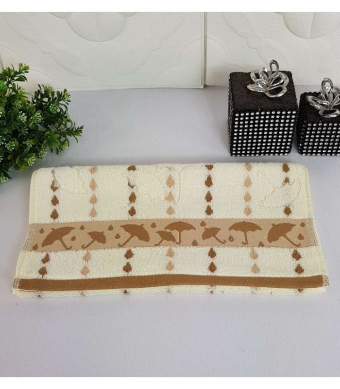 TOALLITA 0.35X0.70 COLOR CREMA CON DETALLE MARRON
